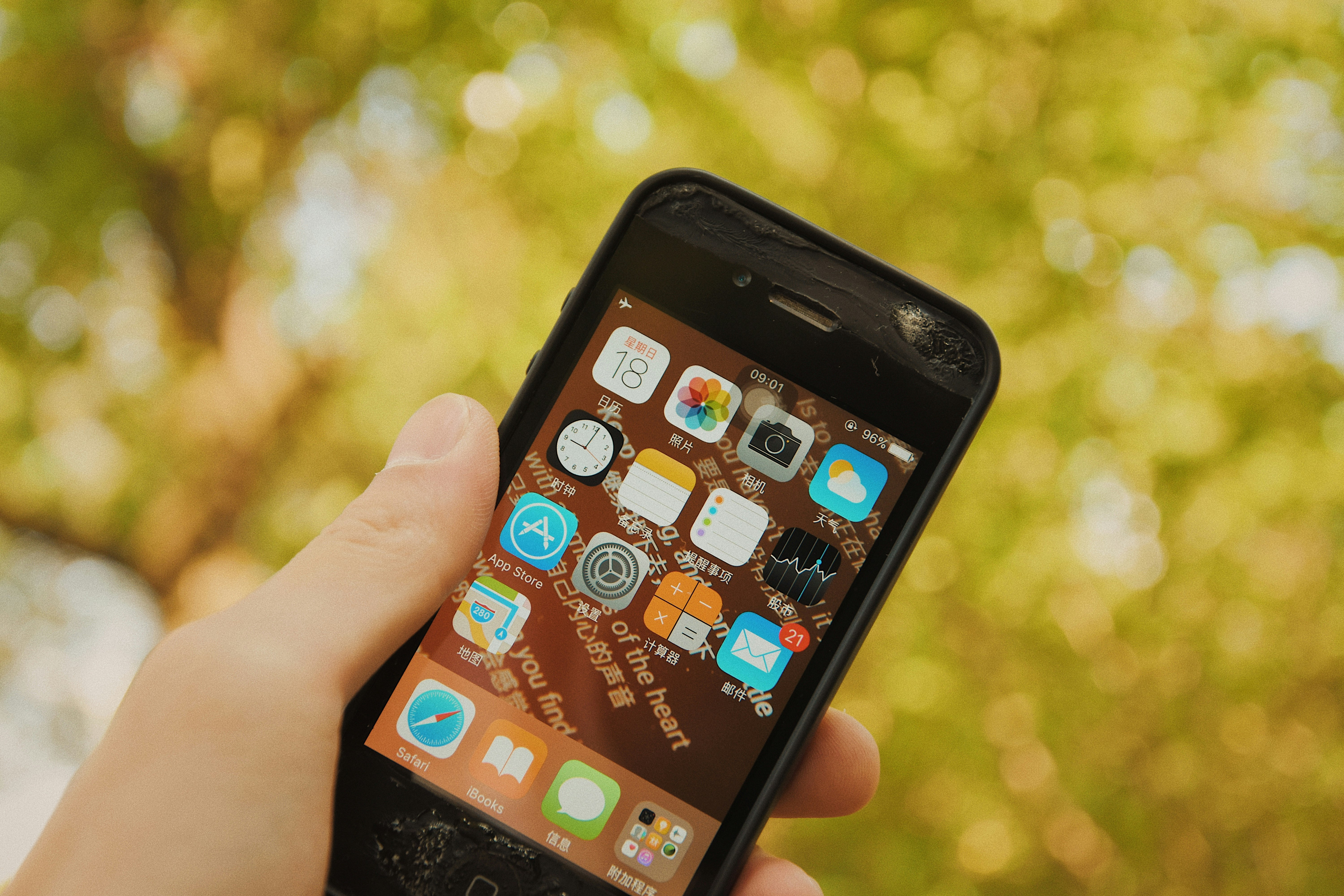 person holding black iphone 4